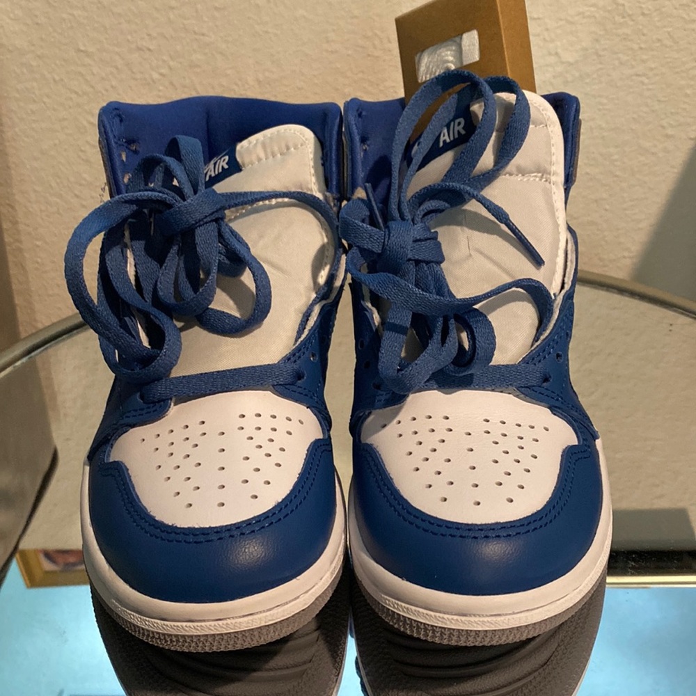 Brand new, never worn, Blue and Grey Retro Jordan One’s High, not mids. No box